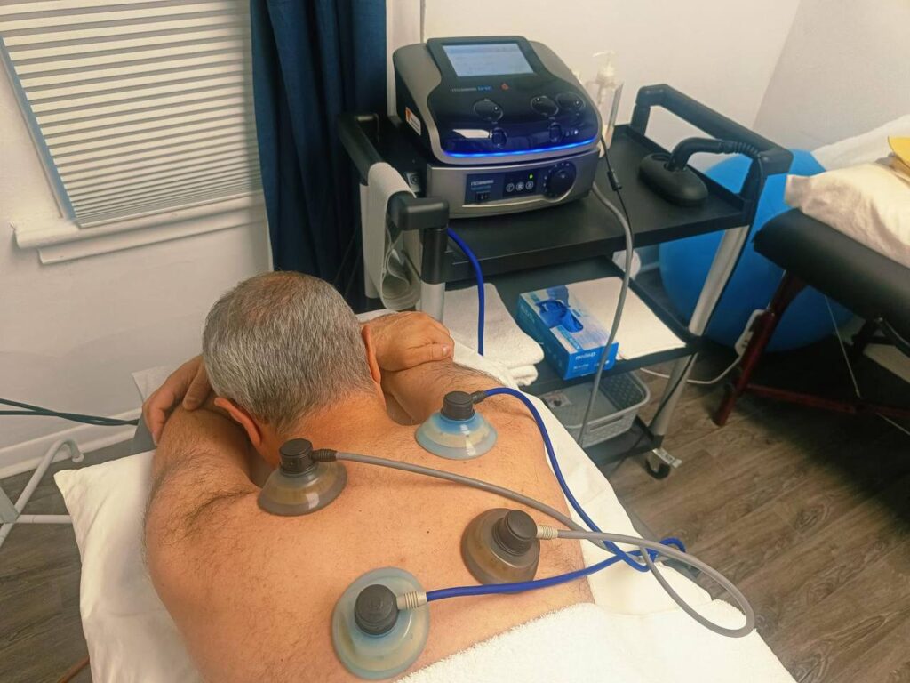 Interferential Current (IFC) and cupping therapy for chronic back pain relief in Richmond Hill